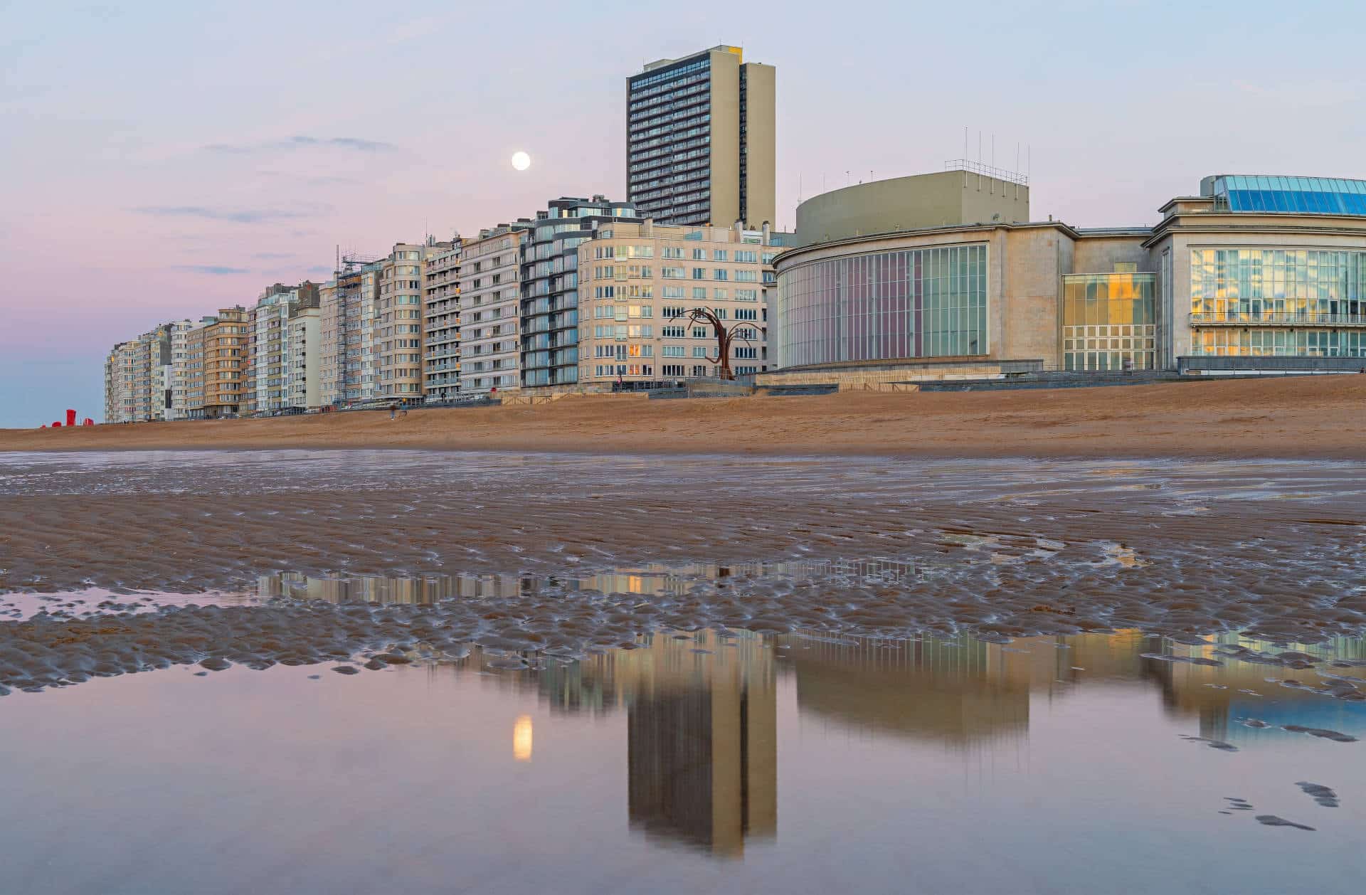 Skyline,Of,Oostende,(ostend),With,North,Sea,Beach,At,Sunset